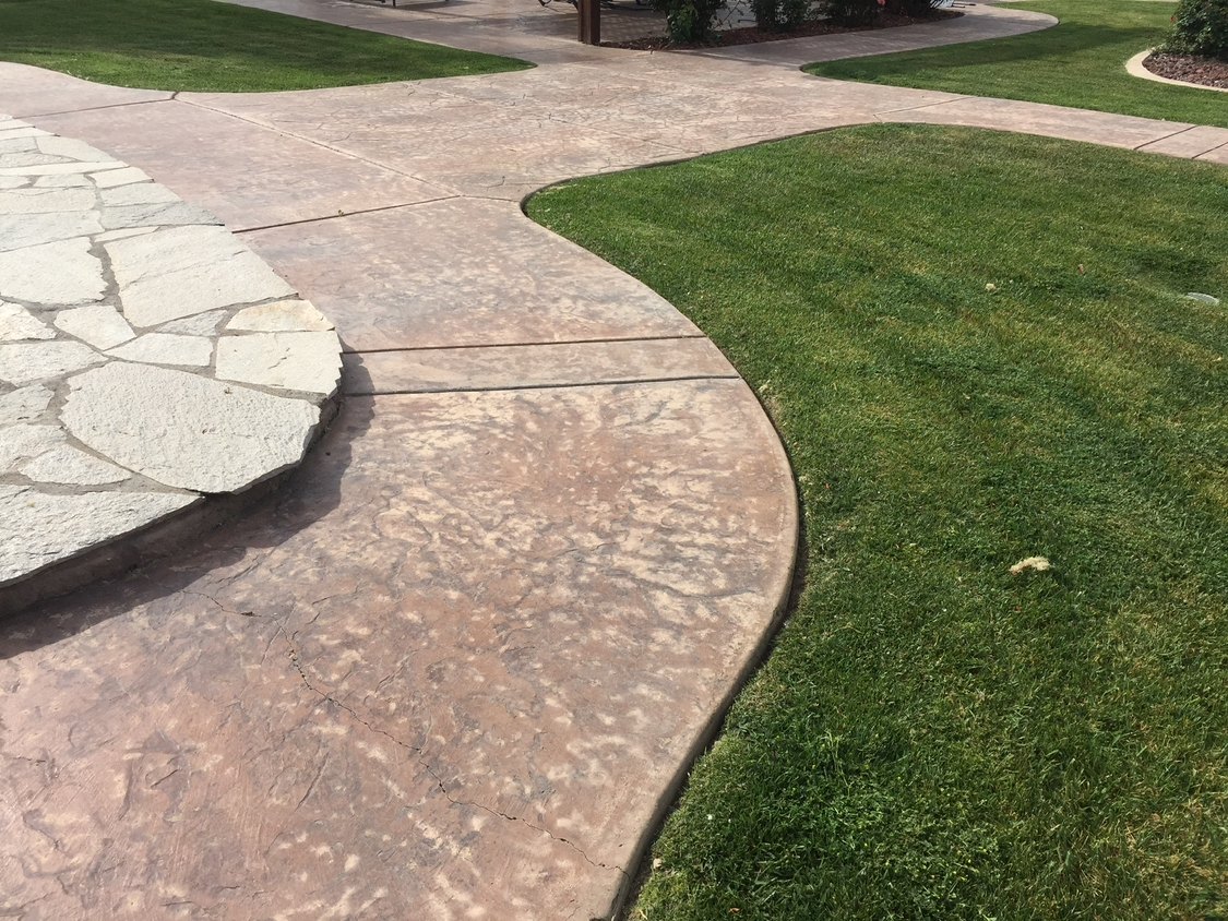 Completed curved stamped-concrete walkway